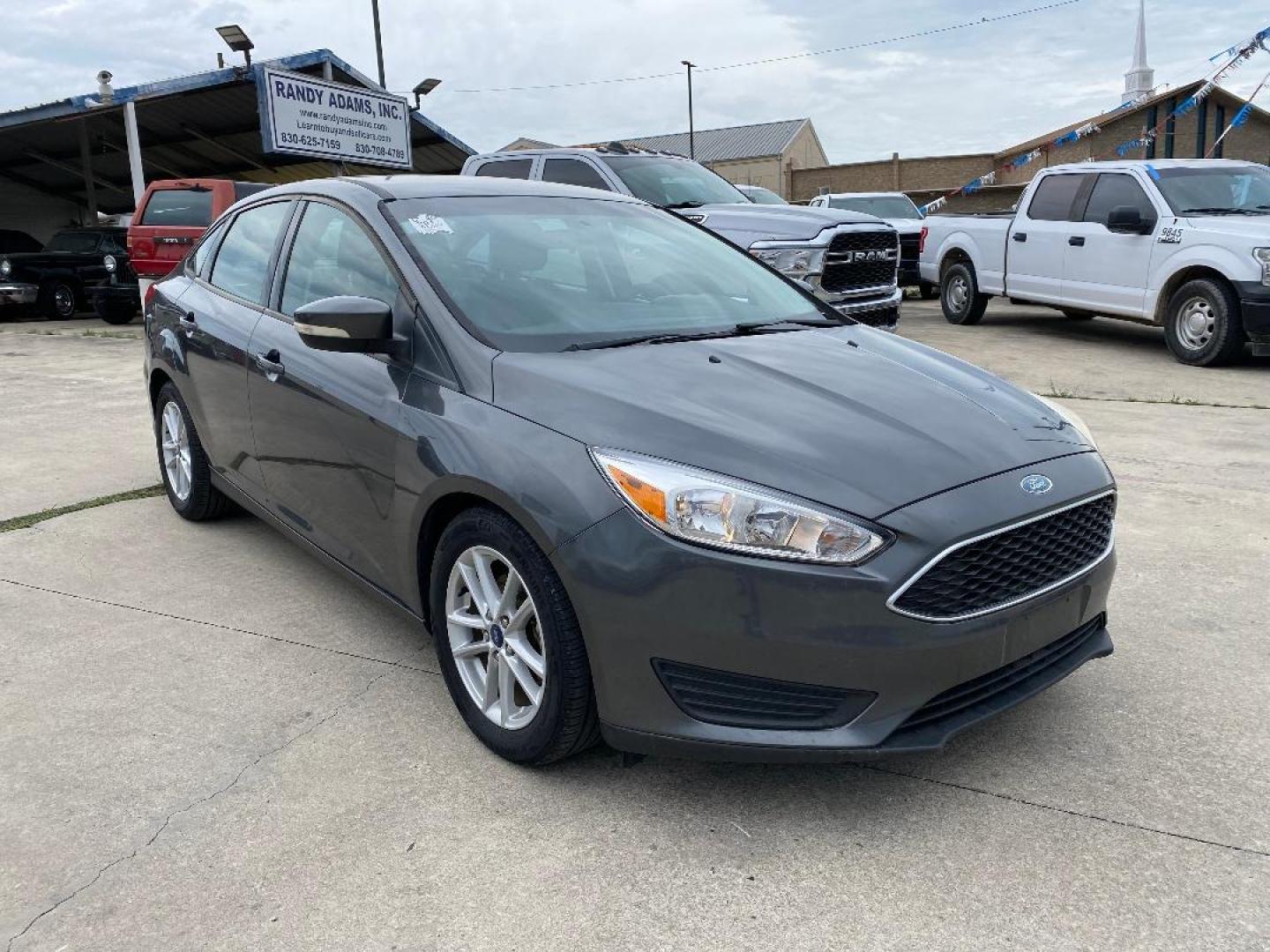2017 Grey /Black Ford Focus (1FADP3F2XHL) , located at 1687 Business 35 S, New Braunfels, TX, 78130, (830) 625-7159, 29.655487, -98.051491 - Photo#5